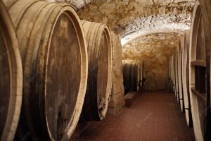 old-cellar-winery-with-barrels-wine_213438-1785